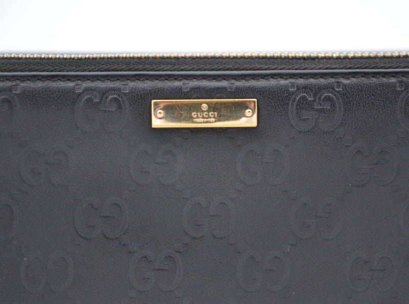 Cartera larga Gucci Zippy en cuero negro Guccissima