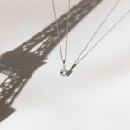 Pendentif "Tonga" D0,02/1 & Topaze 1,5/1 - Or Blanc 375/1000
