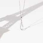Pendente "Infinito" diamanti 0,08/15 - Oro bianco 375/1000