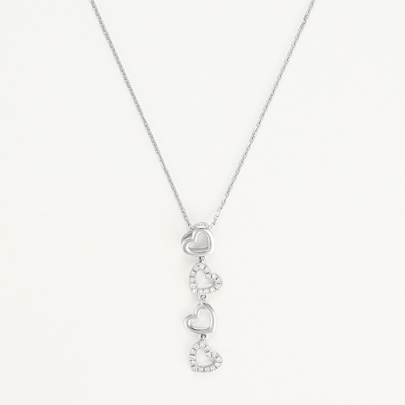 Colgante "4 Corazones" D0.13/28 - Oro blanco 375/1000