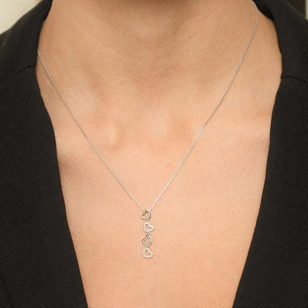 Pendentif "4 Coeurs" Diamants 0,13/28 - Or Blanc 375/1000