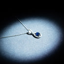 Pendentif "Blue Tear" D0,05/10 + S0,57/1 - Or Blanc 375/1000