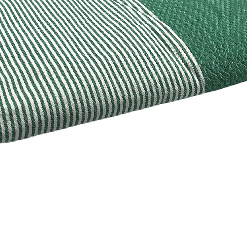 Zoom sobre la Fouta nido de abeja verde esmeralda - BY FOUTAS