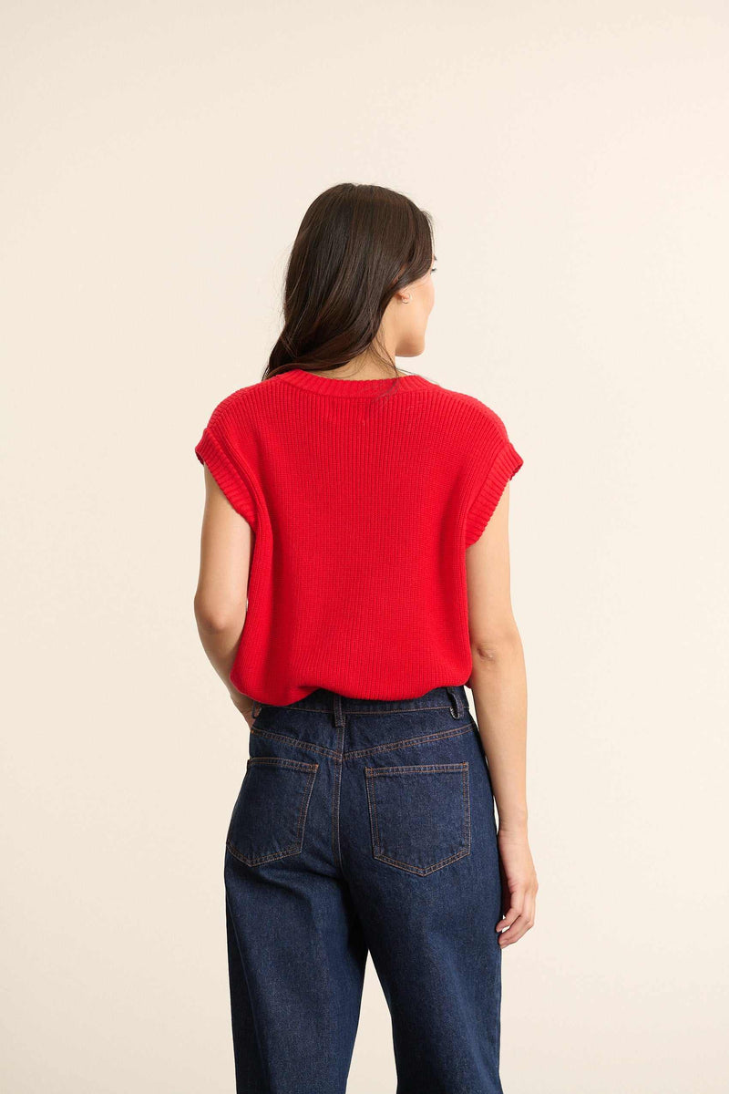 Vue arrière du gilet sans manches BISOU, coupe droite avec finitions en bord-côtes ton sur ton à la base. 