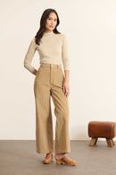 Pantalon en velours beige 100 % coton, collection Garance Paris automne hiver 2025, coupe droite et poches dos et devant.