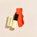 Pomponne barra de labios hidratante natural tinte naranja Sixties