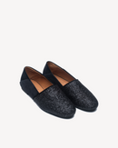 Terciopelo sin cordones y purpurina.