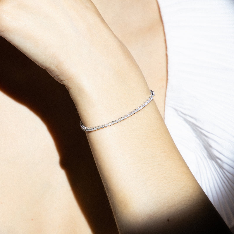 Bracelet " Rivière 1 Carat" D1Ct/65 - Or Blanc 375/1000