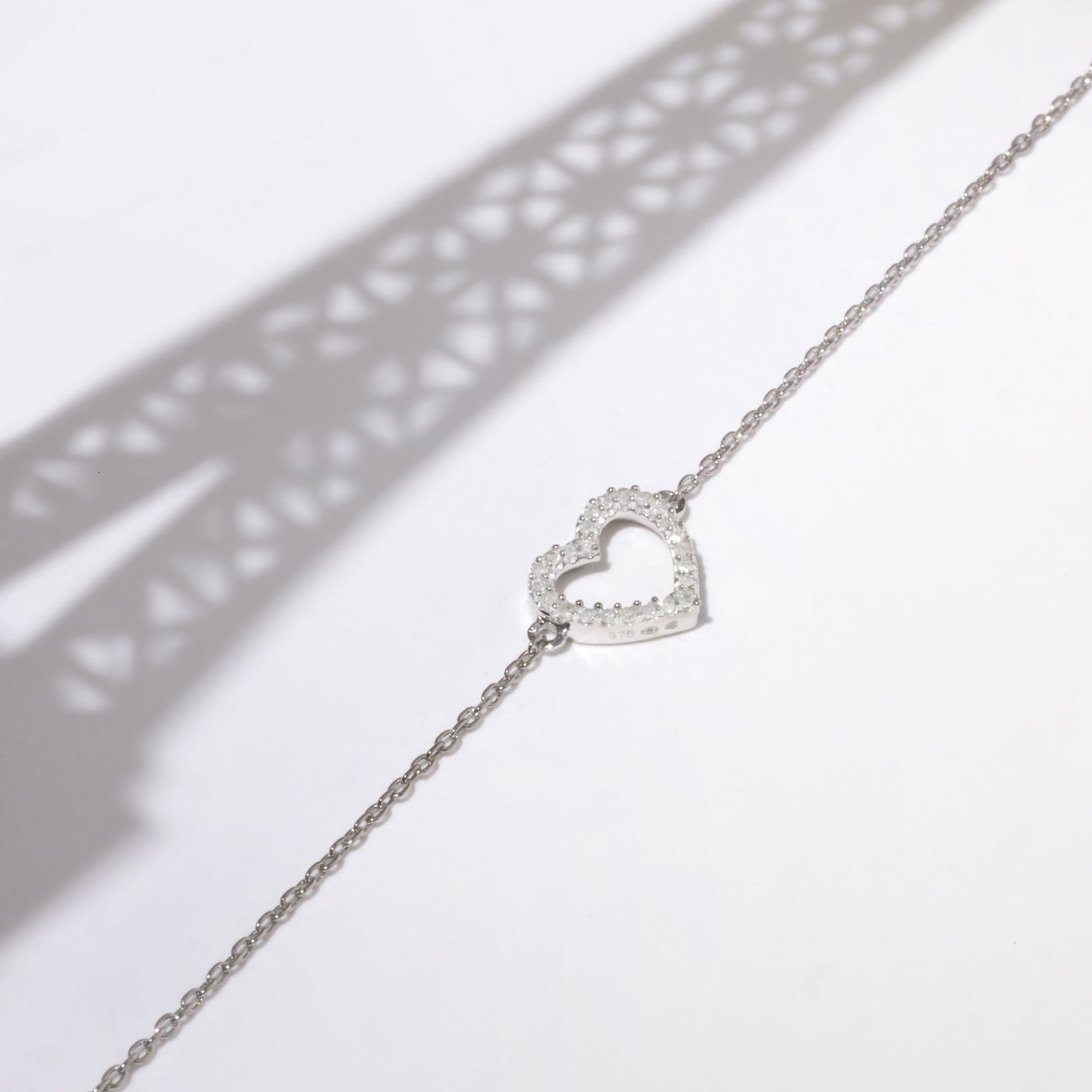 Pulsera “Tu Portes Mon Coeur” D0.05/24 – Oro blanco 375/1000