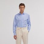 Hast – Blue Two-Ply End-on-End Shirt, male model wearing a blue shirt and beige trousers, front view