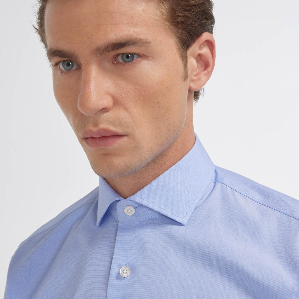 Hast – Blue Two-Ply End-on-End Shirt, man wearing a blue cotton shirt, three-quarter view
