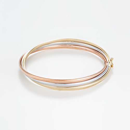 Pulsera “trío dorado” de oro tricolor 375/1000