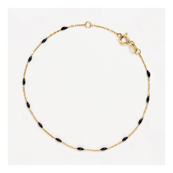 Armband i svart emalj och 9 karat (375/1000) gult guld