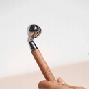 Le roller multi-têtes composé d'un gua sha, d'un roller en obsidienne et d'un boulado.