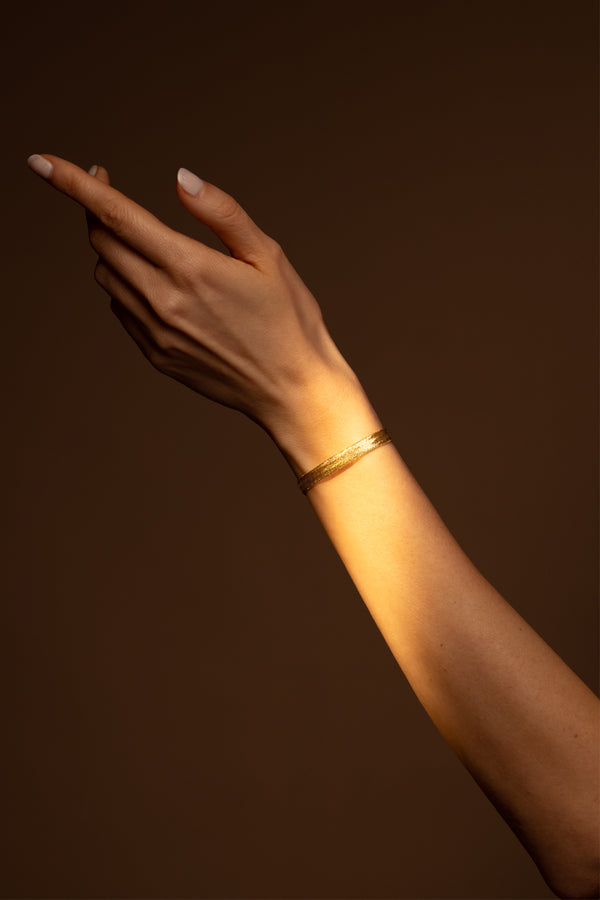 Armband "Maille Tissée 7 mm" geelgoud 375/1000