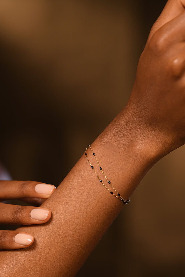 Armband "Double Amada Noir" i 9 karat (375/1000) gult guld