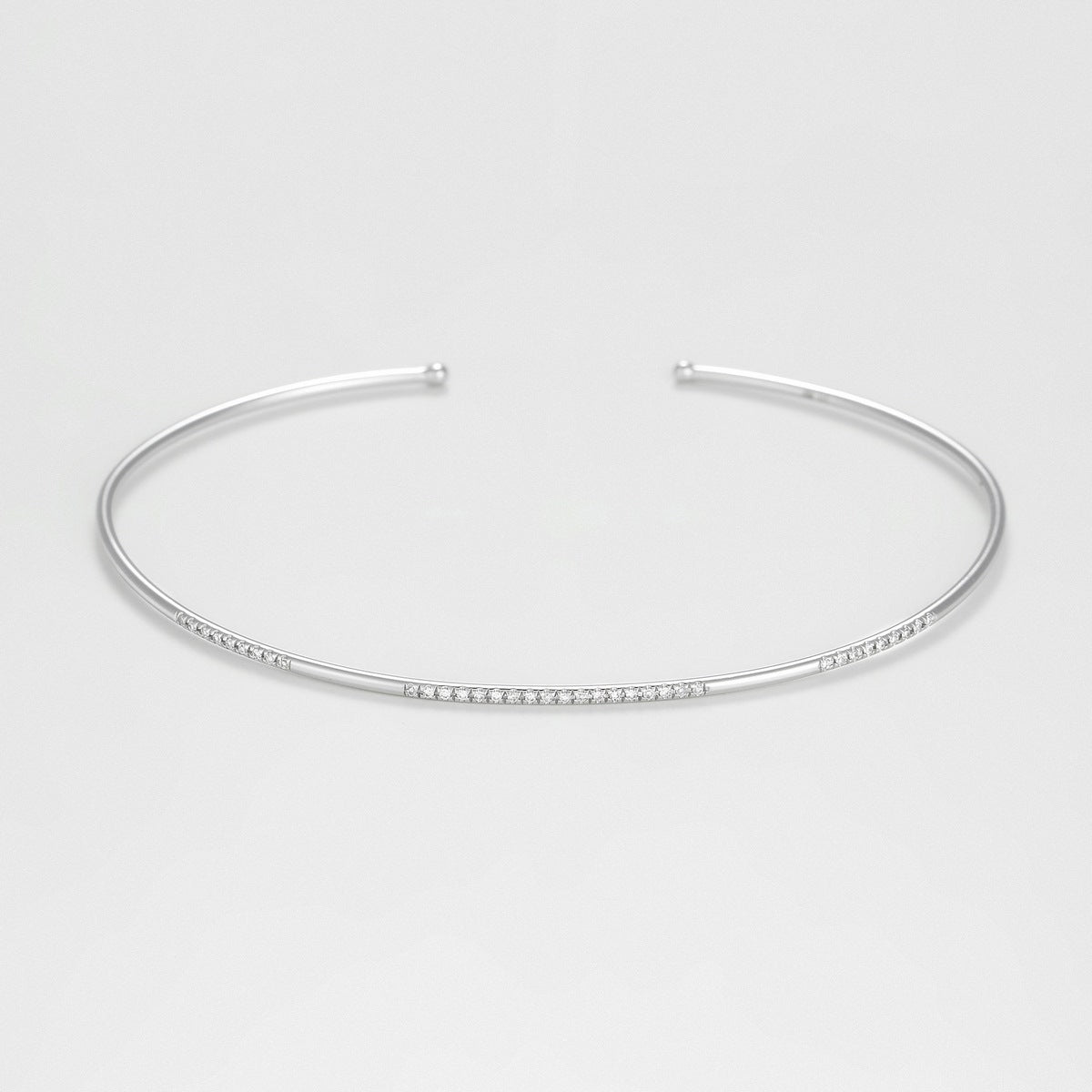 Brazalete “Divided Line Bangle” Diamantes 0.07Ct/36 – Oro blanco