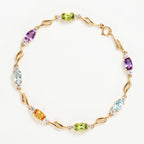 Brazalete “Mon Arc En Ciel” Top blanco 0,92/14; Tapa azul 1,4/2; Amatista 0,9/2; Peri - Oro amarillo 375/1000