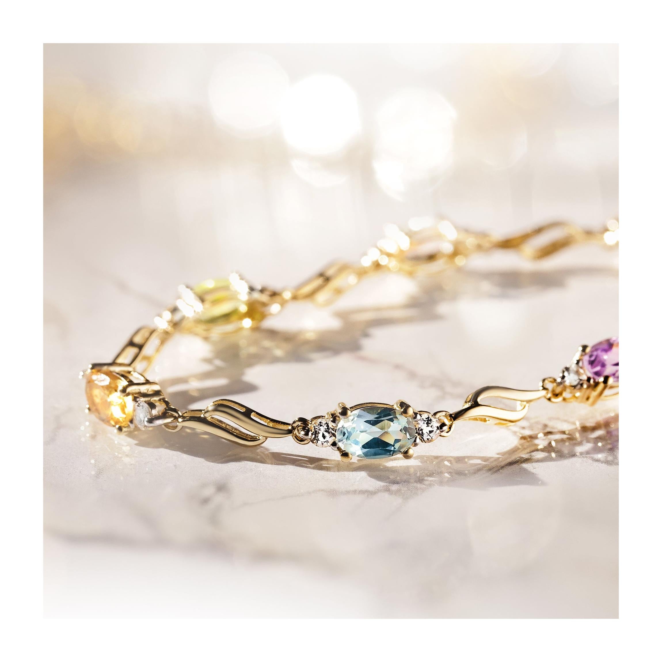 Bracelet "Mon Arc En Ciel" Top Blanche0,92/14;Top Bleue1,4/2;Améthyste0,9/2;Peri