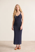 Robe en fines mailles à liserés pailletés sans manches à nœud sur les bretelles coloris marine 
