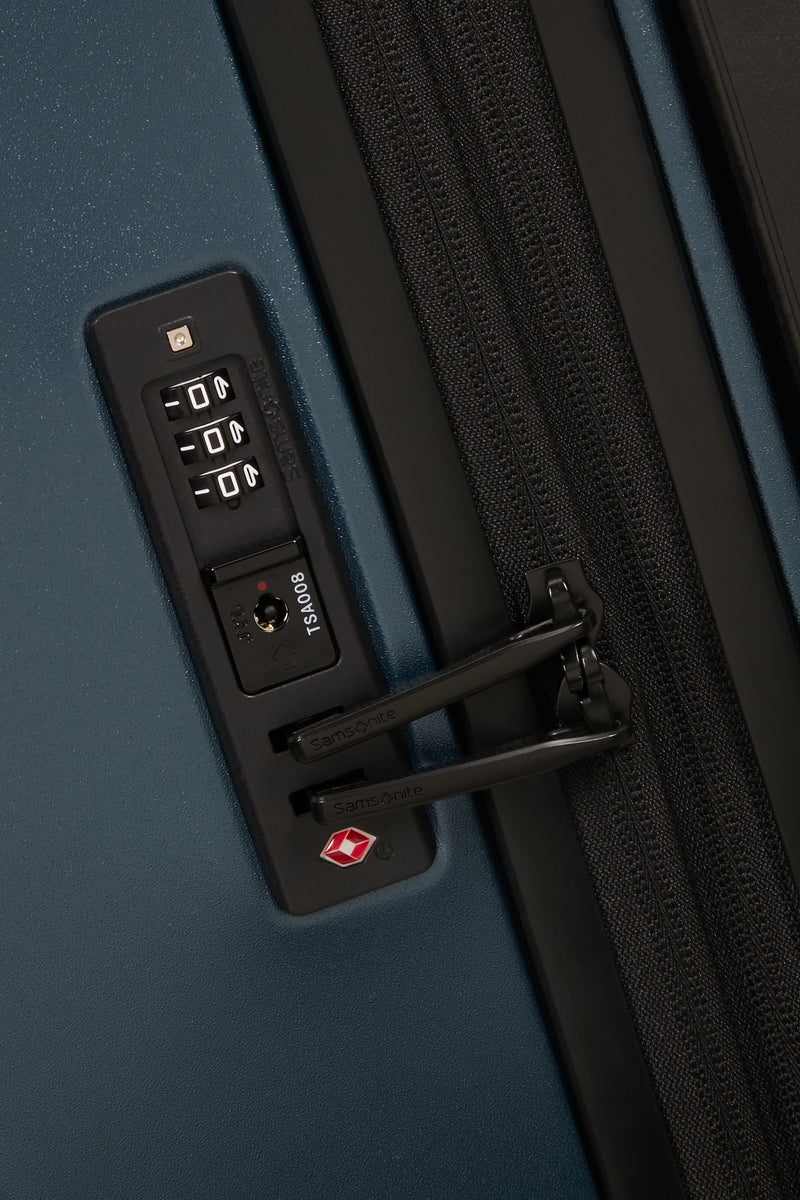 Fyrm Expandable 4-Wheel Suitcase for Medium-Length Trips - Steel Blue