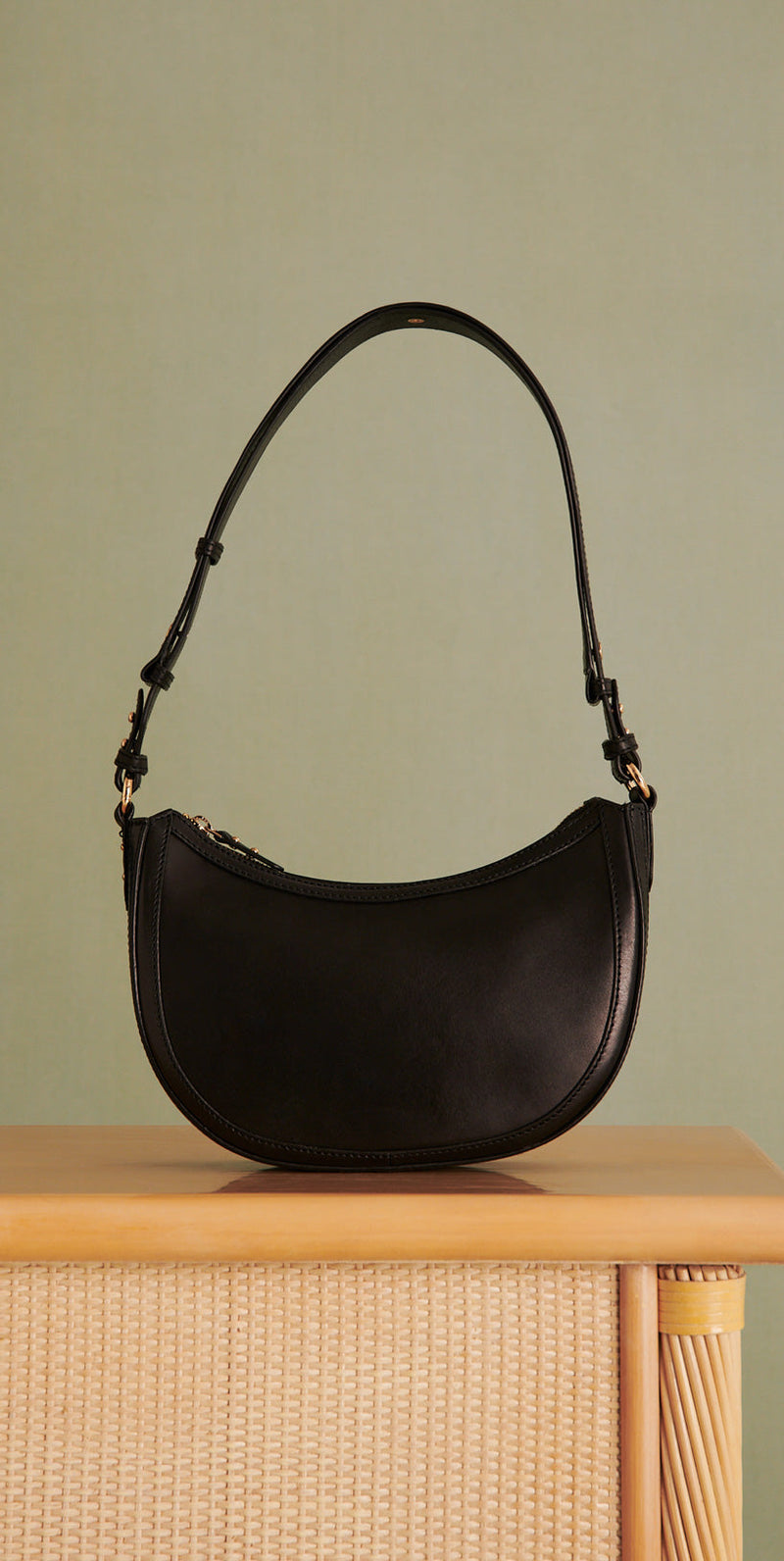 BOLSO SAULA MEDIA LUNA DE PIEL PETITE MENDIGOTE