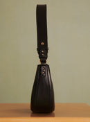BOLSO SAULA MEDIA LUNA DE PIEL PETITE MENDIGOTE