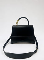 Mittelgroße Ledertasche mit Schließe - Schwarz