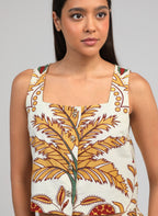 An'ge – Debardeur Symaly Tropico Jaune, haut sans manches blanc cassé à motif palmier jaune et rouge, porté de face