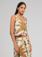 An'ge – Debardeur Symaly Tropico Jaune, mannequin portant un crop top et un pantalon à motifs floraux