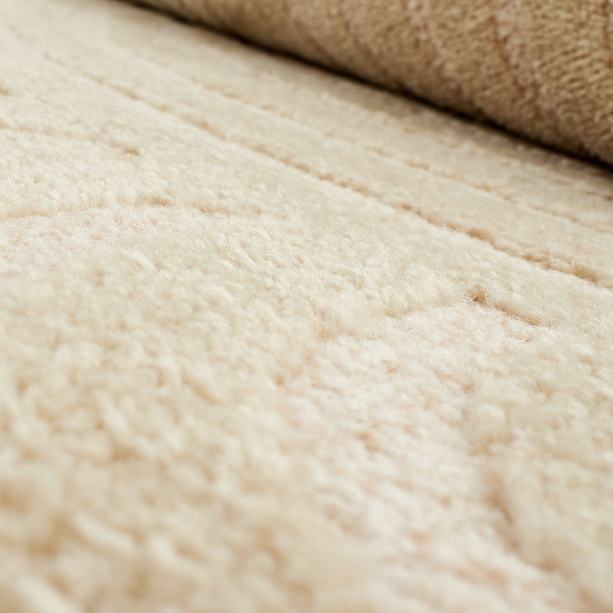 Beige rainbow rug with embossed long pile Nazar rugs