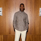 Hast – Brown Houndstooth Wool Overshirt, male model from the front, brown checked jacket, light trousers