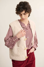 Fermeture par bouton brandebourg contrasté, veste d'hiver sans manches de couleur écru pour femmes.