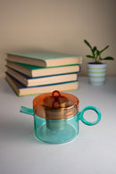 Tetera de vidrio de borosilicato con mango de color - Rojo y azul claro