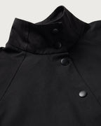 Black Kusama sustainable trench coat - silhouette 3