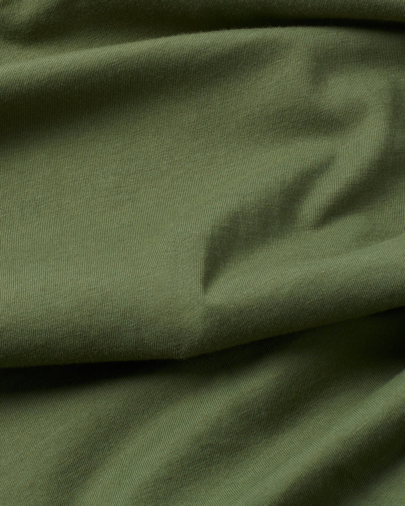 Camiseta verde Here comes the sun sostenible  - silueta 2