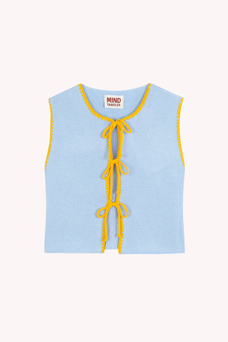 Chaleco de punto celeste y amarillo