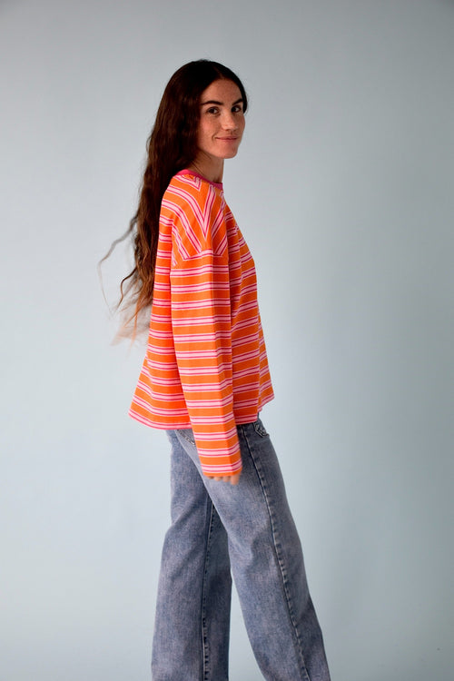 T-Shirt Pipa Naranja y Fucsia