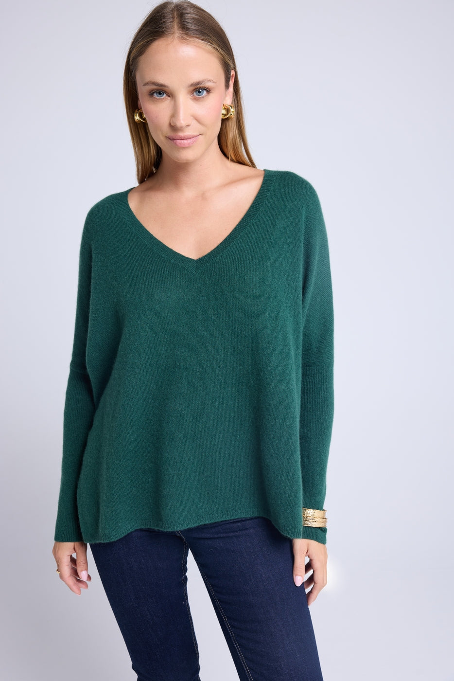 Sweter ponczo z dekoltem V Zancha – butelkowa zieleń – damski