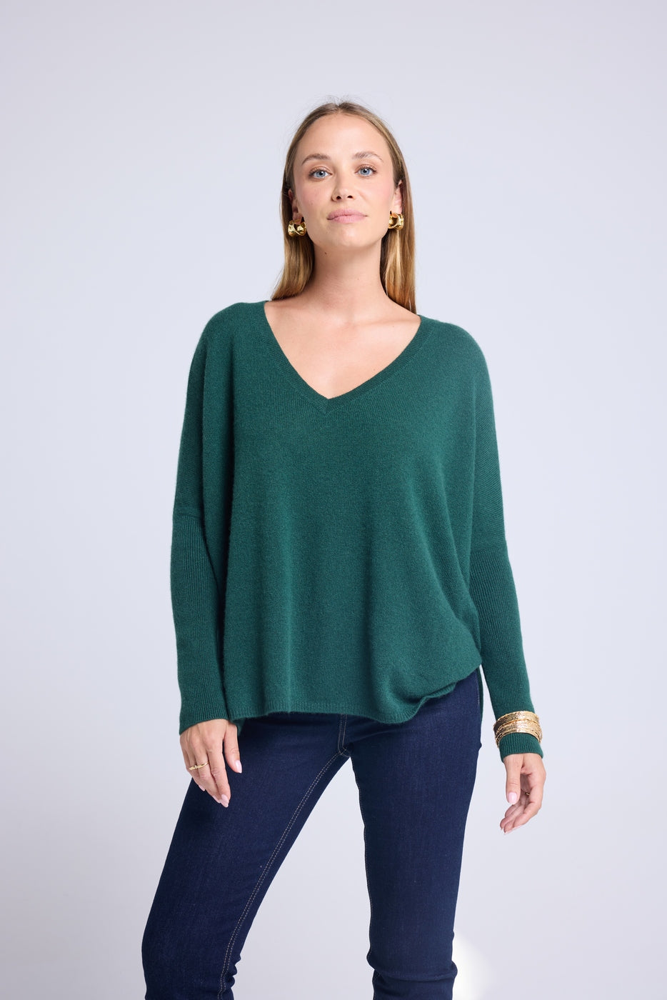 Sweter ponczo z dekoltem V Zancha – butelkowa zieleń – damski