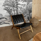 Kuna - Sillón de teca y piel trenzada negra