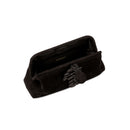 Alessa Black Pouch Bag interior view featuring a magnetic tab and decorative thread-wrapped coins.