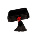 Alessa Black Pouch Bag showcasing a silk satin finish with a unique tassel and thread-wrapped design.