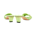 Back view of Almeria mid-heel sandals in avocado leather with stylish braided straps and contemporary block heel design.