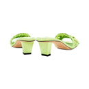 Back view of Almeria mid-heel sandals in avocado leather with stylish braided straps and contemporary block heel design.