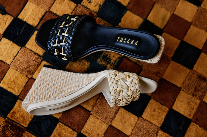 Almeria black wedge sandal featuring braided details and a stylish design, perfect for summer outings.