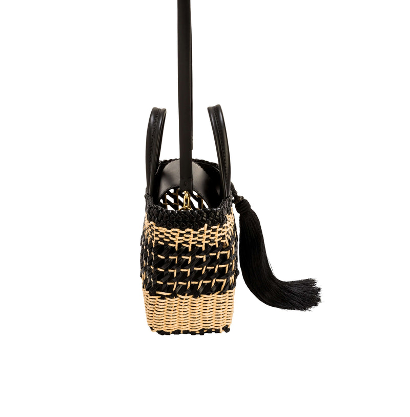 Almeria Tassel Black Mini Tote Bag featuring raffia weave and soft leather trim, perfect for stylish everyday use.