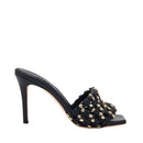 Aurnia black high-heel sandals featuring a chic woven design with gold accents, perfect for stylish occasions.