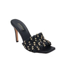 Aurnia black high-heel sandal featuring elegant woven design and gold accents, perfect for stylish occasions.