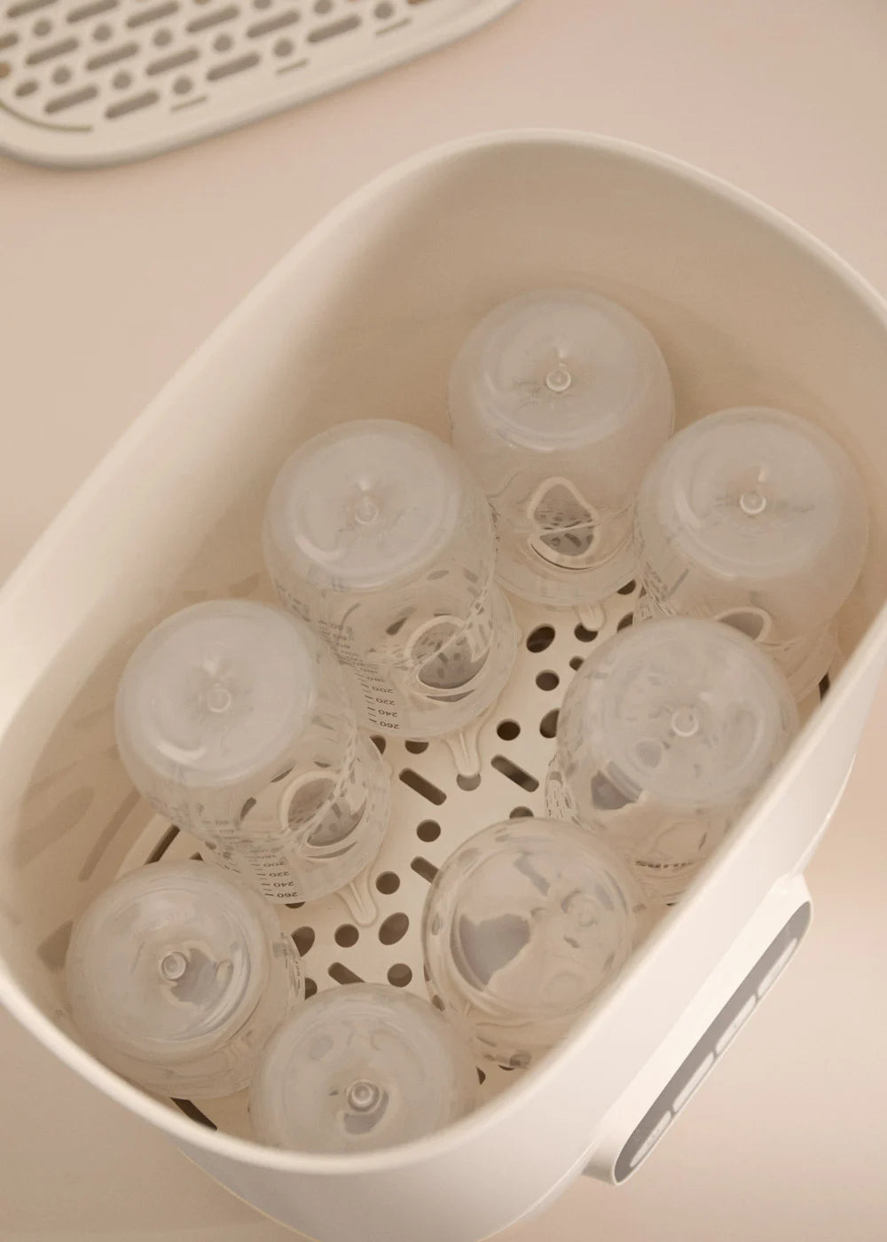 Baby Bottle Care - Esterilizador multifunción con secado para 8 biberones - Blanco roto